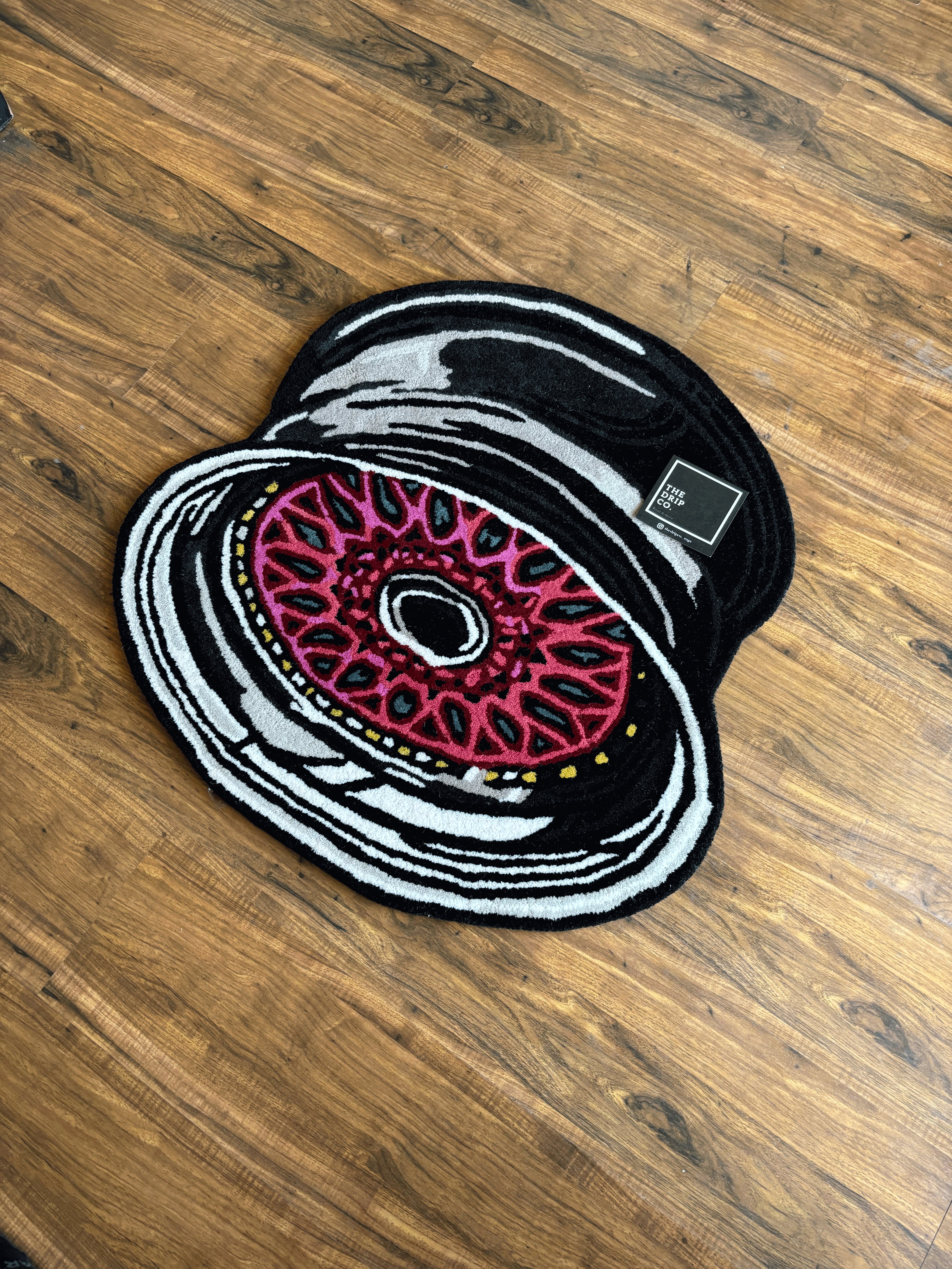 Allow Wheel Hand Tufted Custom Rug by The Drip Co.