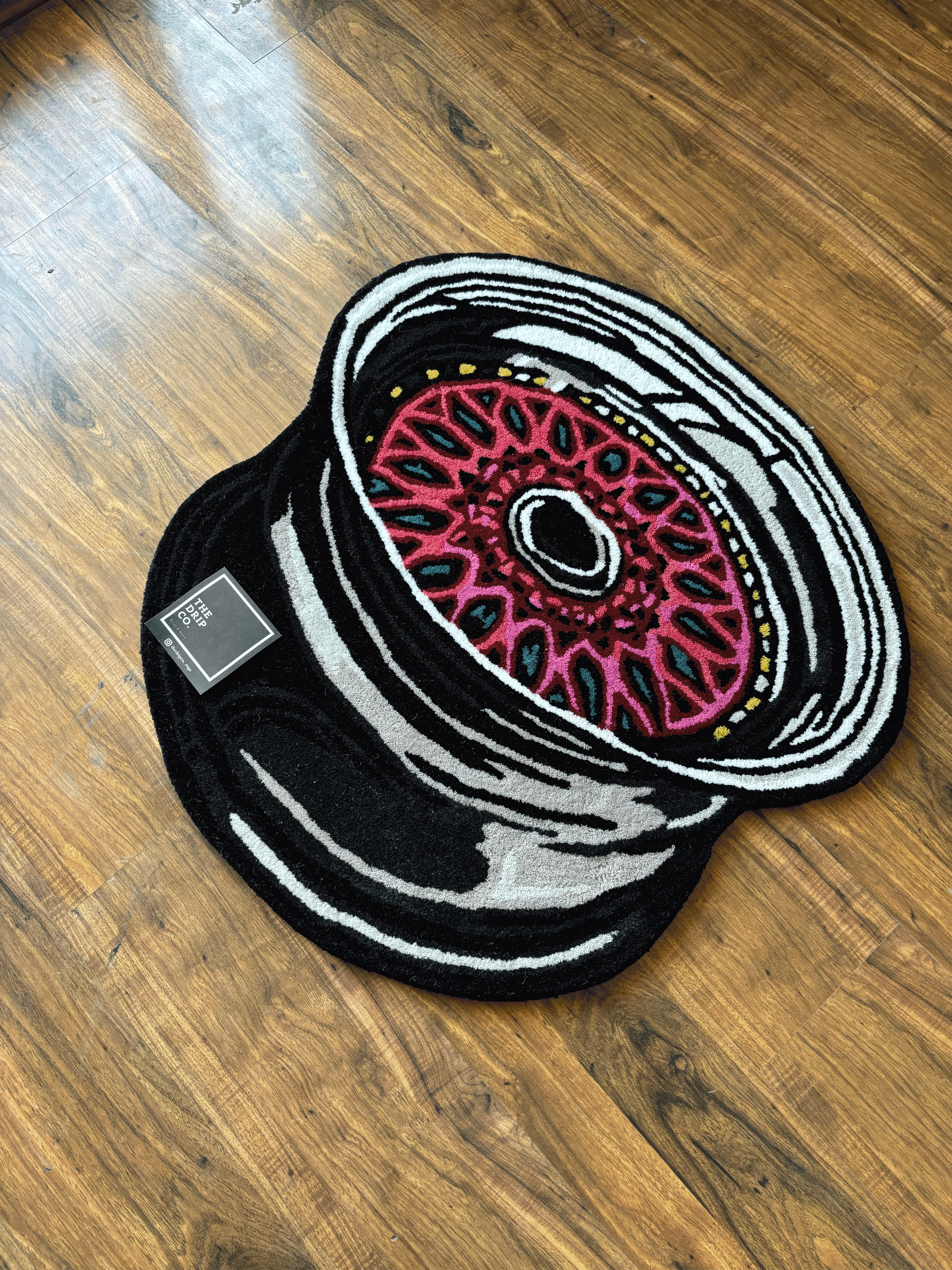 Allow Wheel Hand Tufted Custom Rug by The Drip Co.