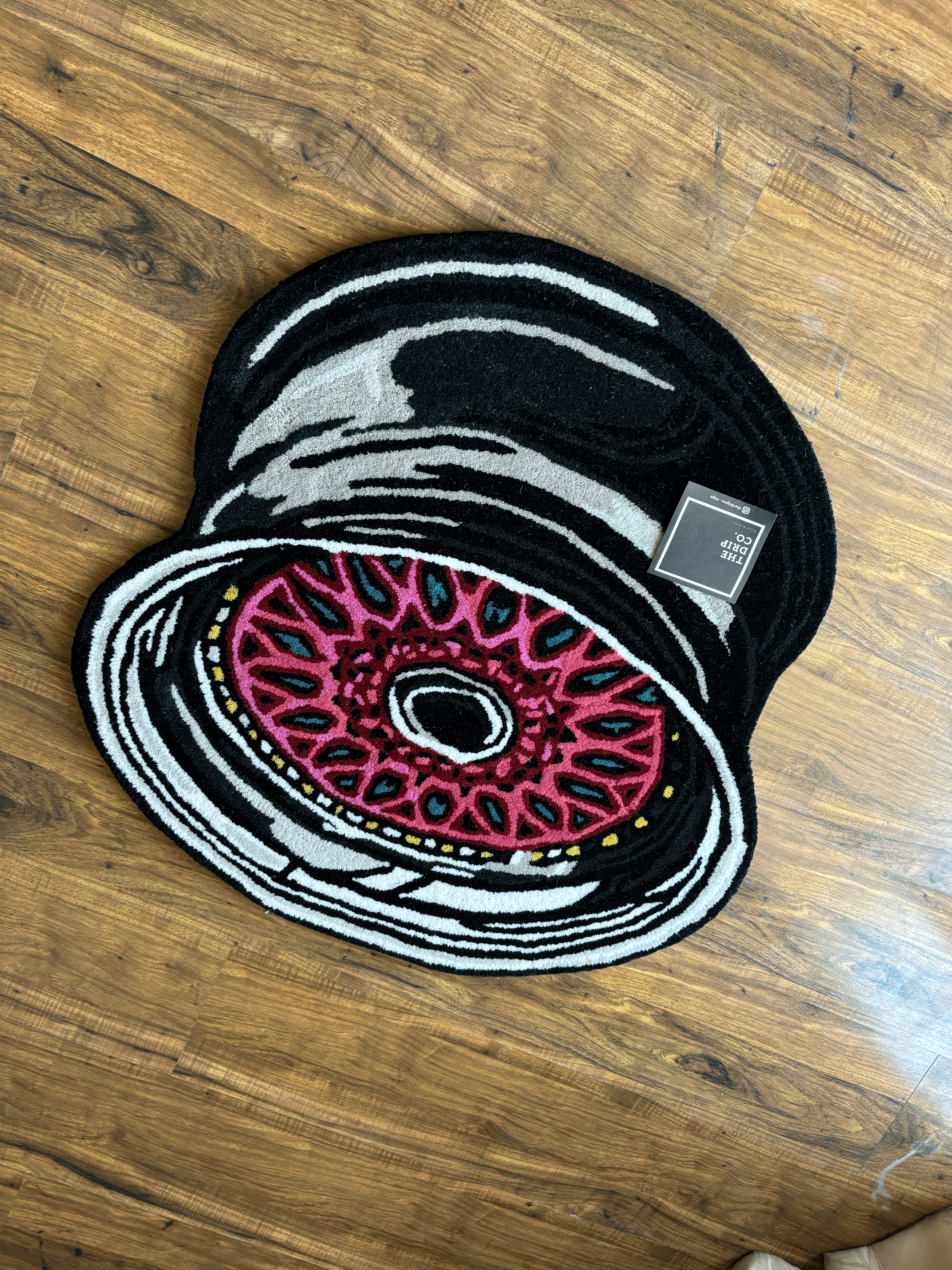 Allow Wheel Hand Tufted Custom Rug by The Drip Co.