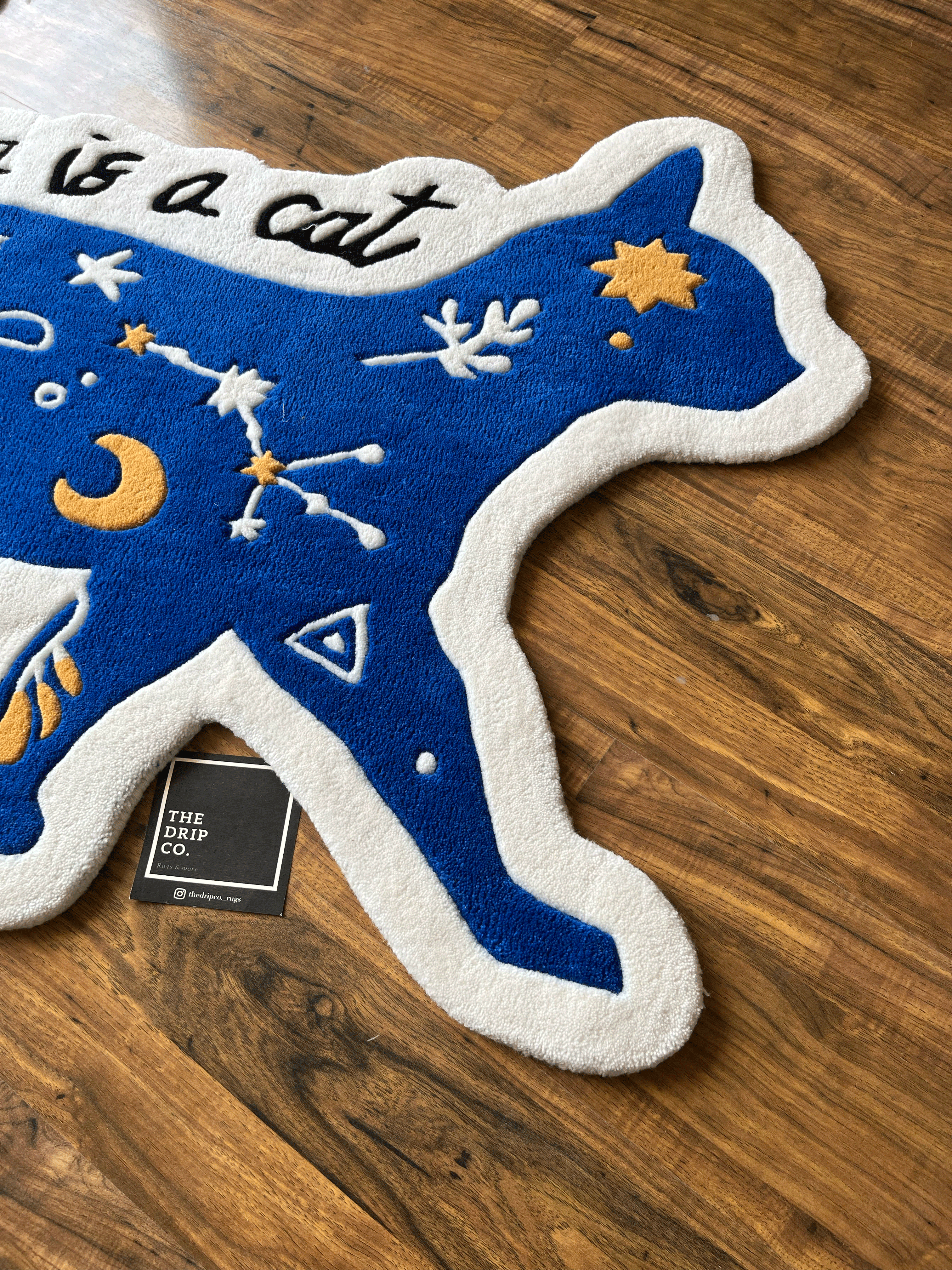karma is a Cat hand tufted Custom Rug by The Drip Co.