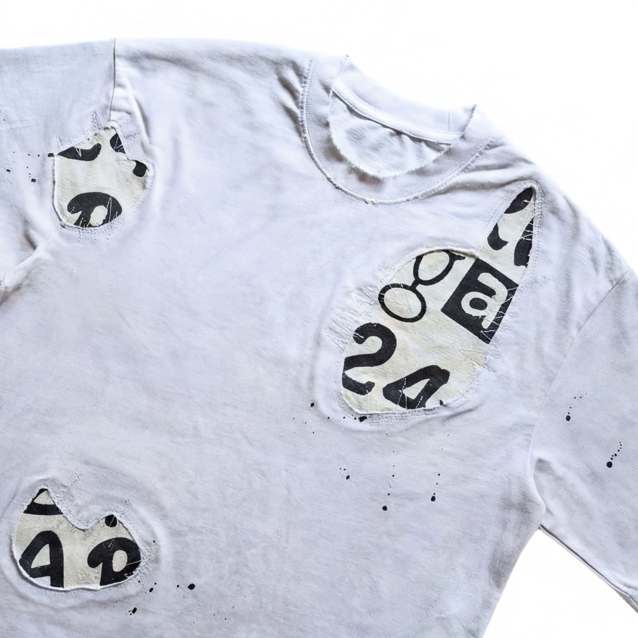 RECONSTRUCTION TEE