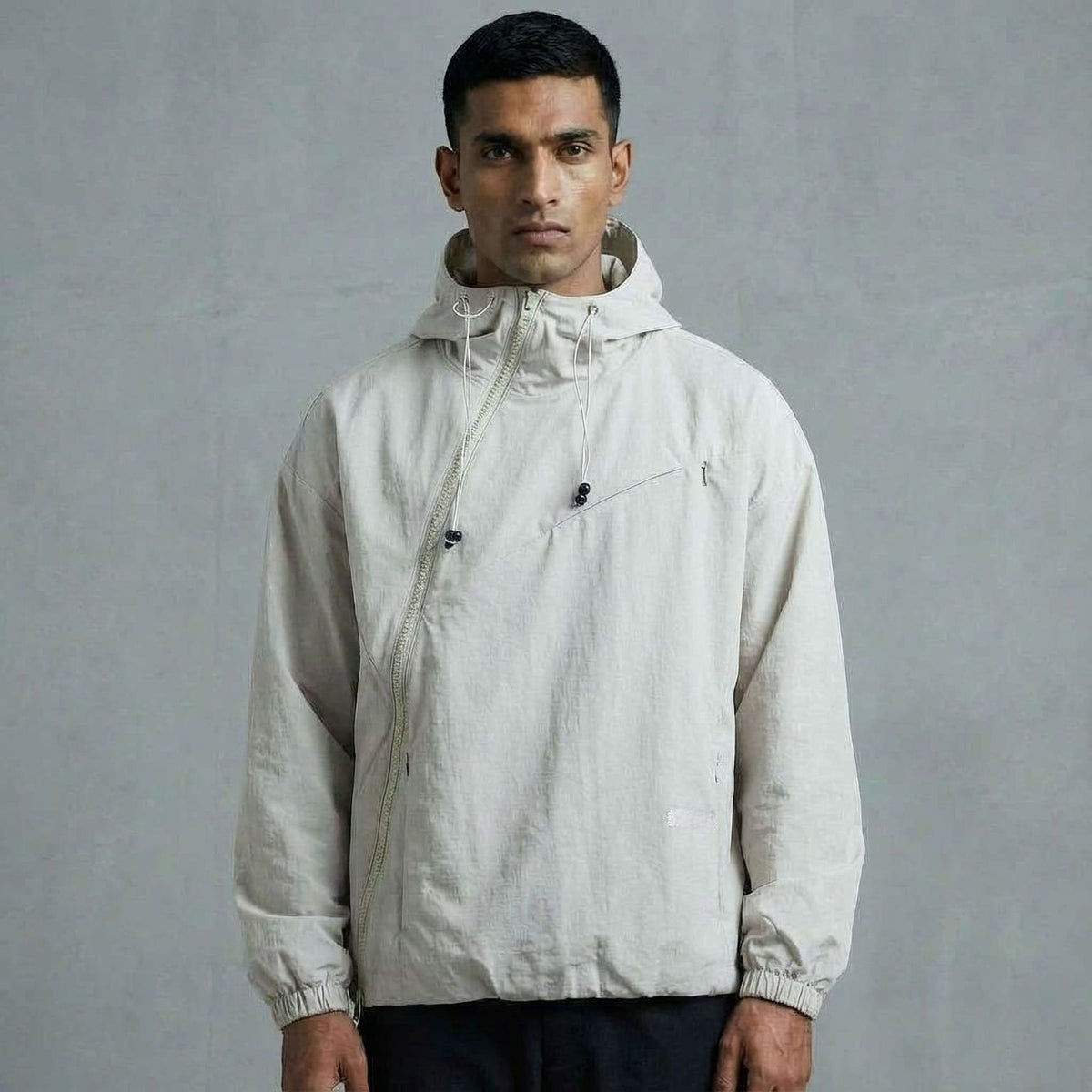 ASYMMETRIC SHELL JACKET- LIGHT GREY