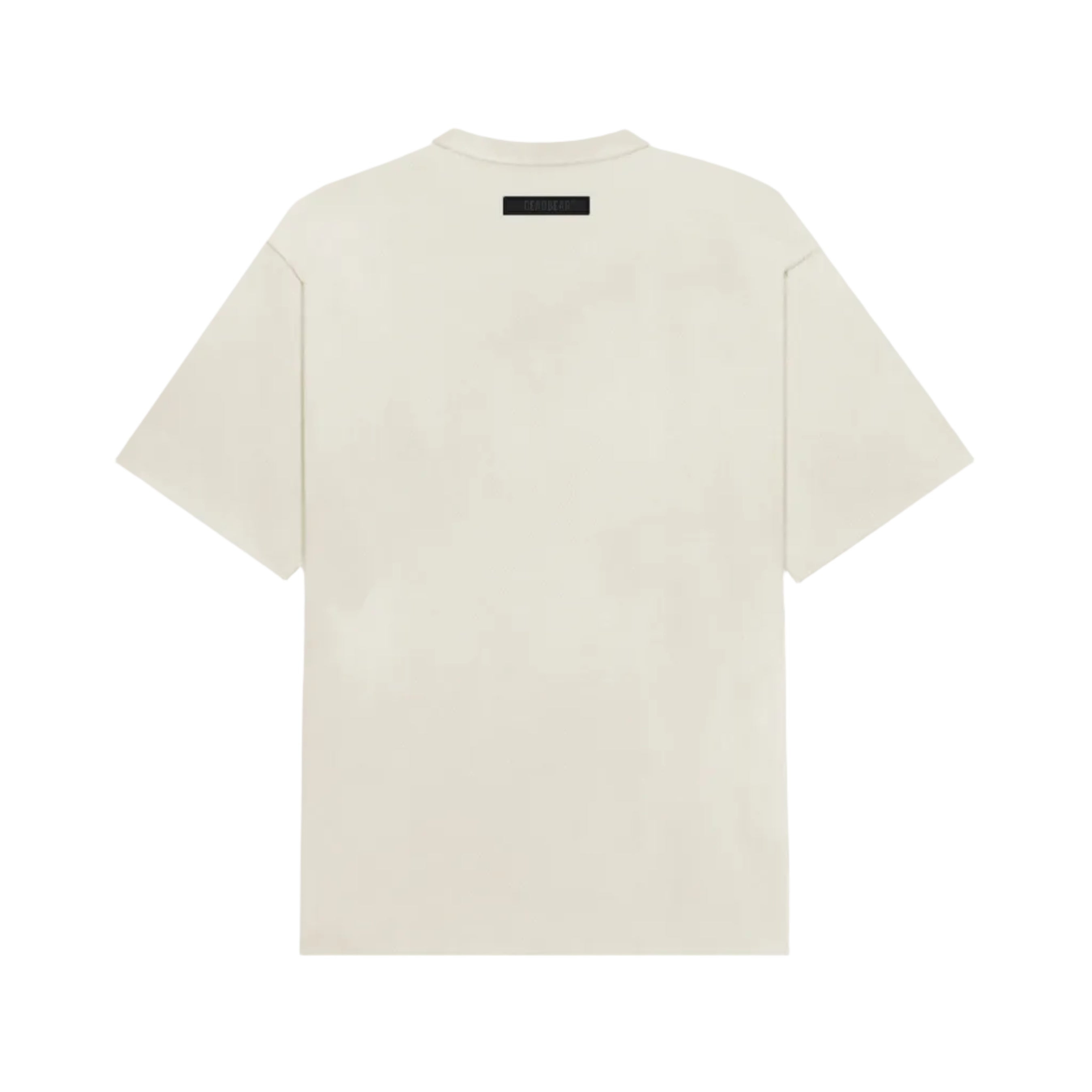 Beige t-shirt with a black label on the back against a white background Crepdog Crew