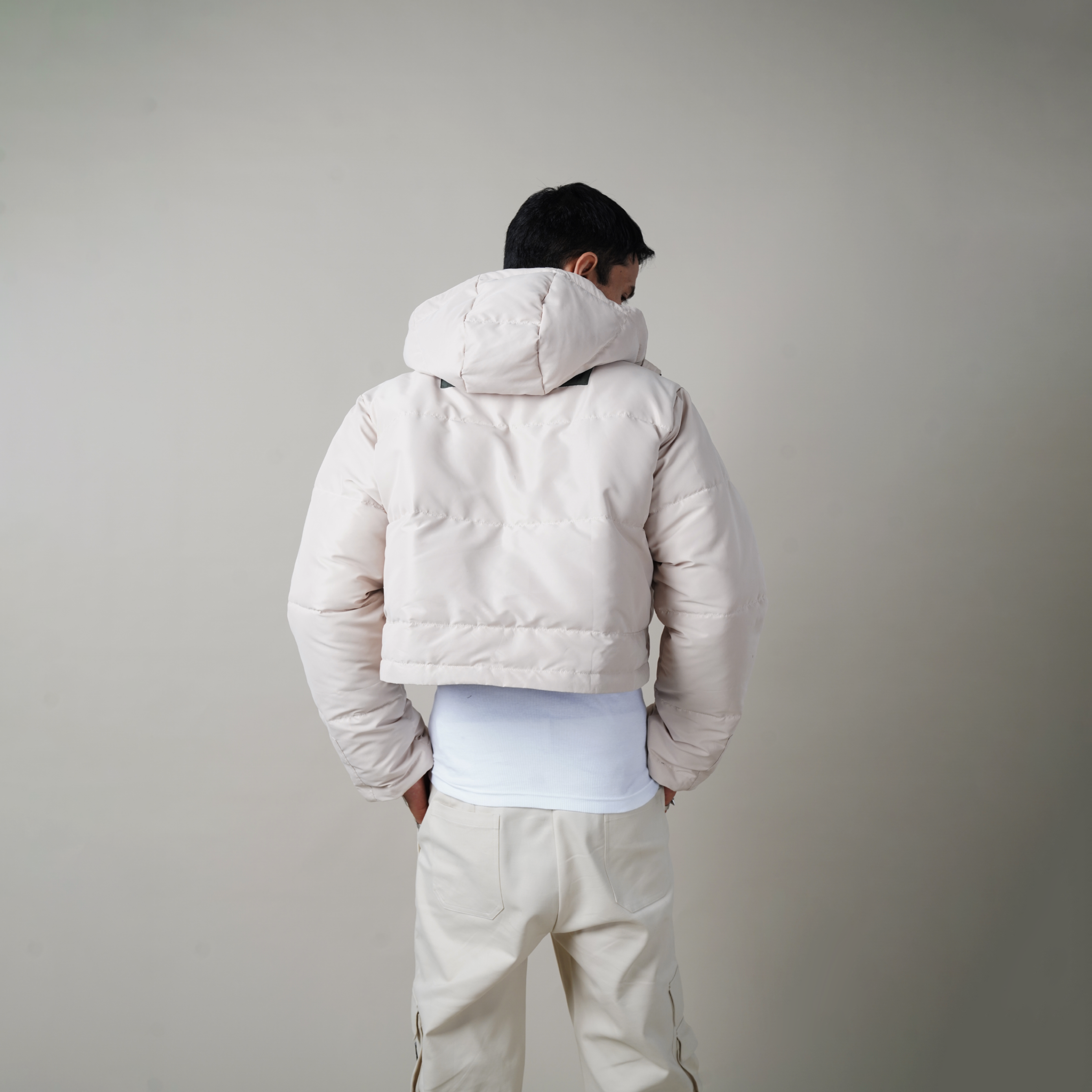 winter collection, winterwear, fall winter, warping theories, warping theories loyalty program, The Cropped Puffer Jacket,Polyester fabric, two-toned, jetted pockets, pipe-in details, Welt pocket, Warping Theories Rubber patch on the chest, high neck collar. The detachable hoodie, Unisex, Oversized Fit ,Wind Proof, Water Repellant, pufferjacket, northface puffer, puffer, puffercoat,superpuff aritzia, mens puffer, womens puffer, northface cropped puffer, womenswear, menswear, people also ask