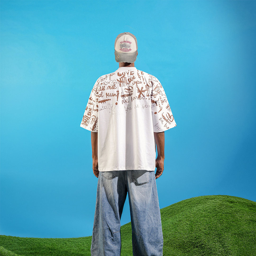 Person wearing a patterned shirt and cap on a grassy hill with a blue sky background Crepdog Crew