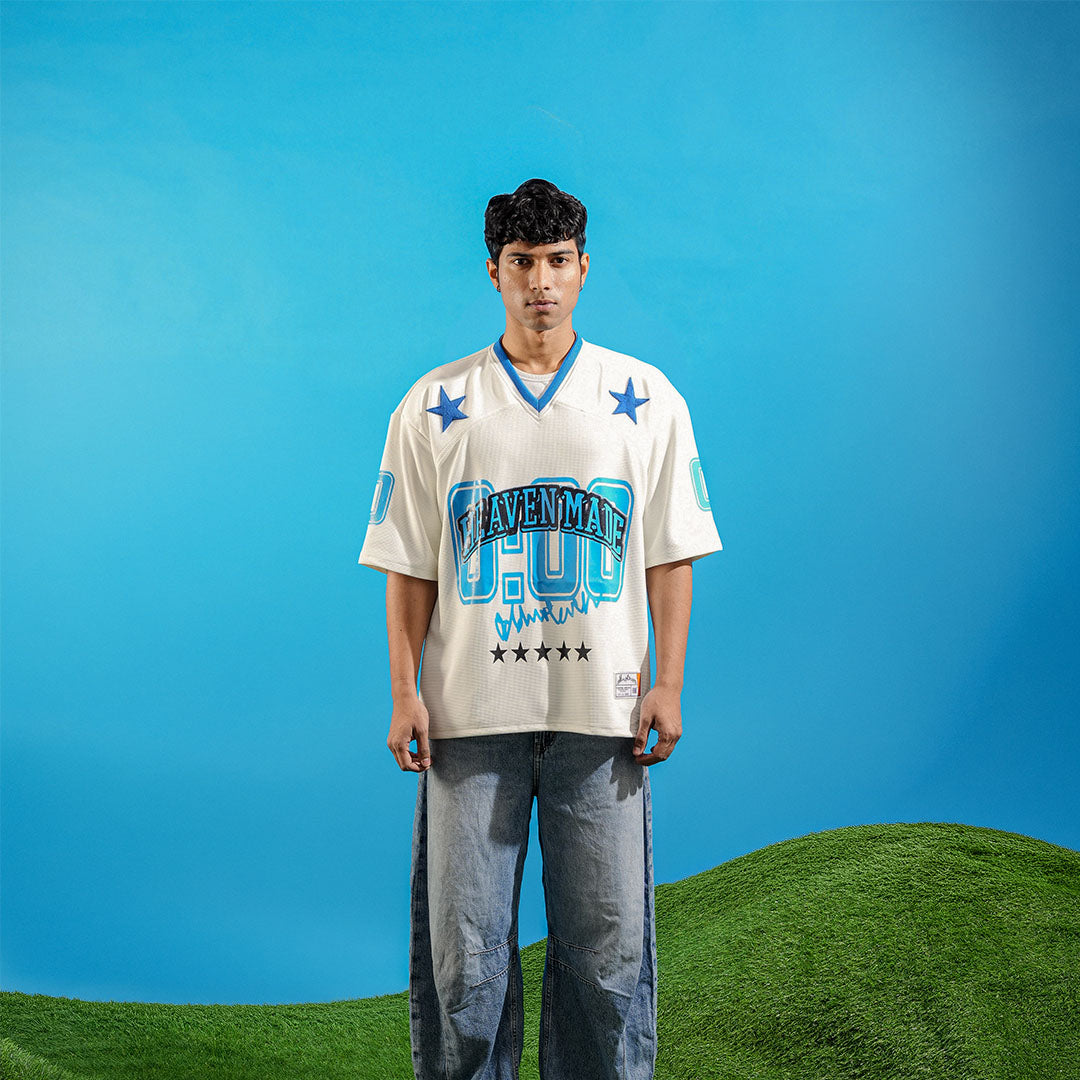 Person wearing a sports jersey with 'DAVENPORT' printed on it against a blue sky and green grass background Crepdog Crew