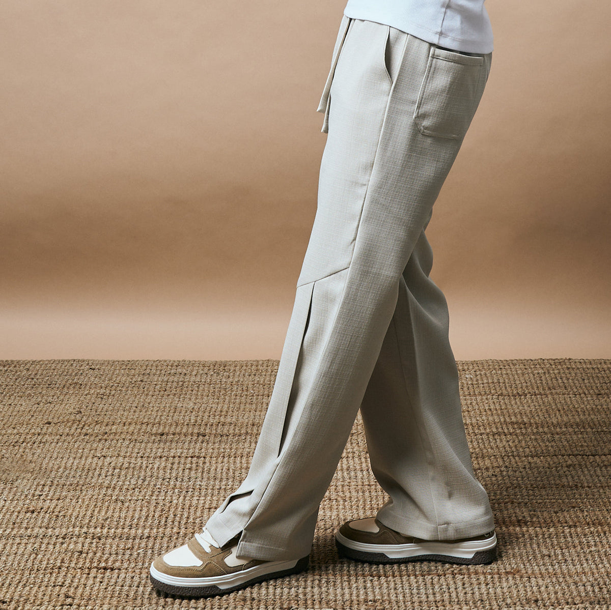 PLEATED ARCH CUT PANTS- BISCUIT