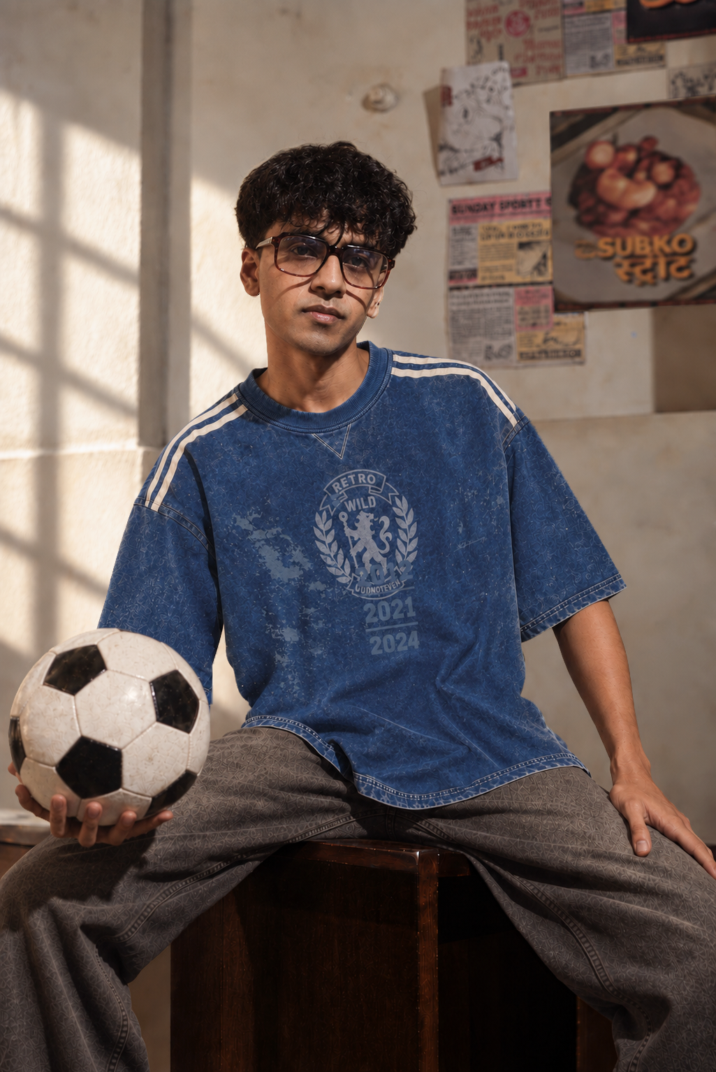 Model wearing the Blue Lions Retro Tee, front view