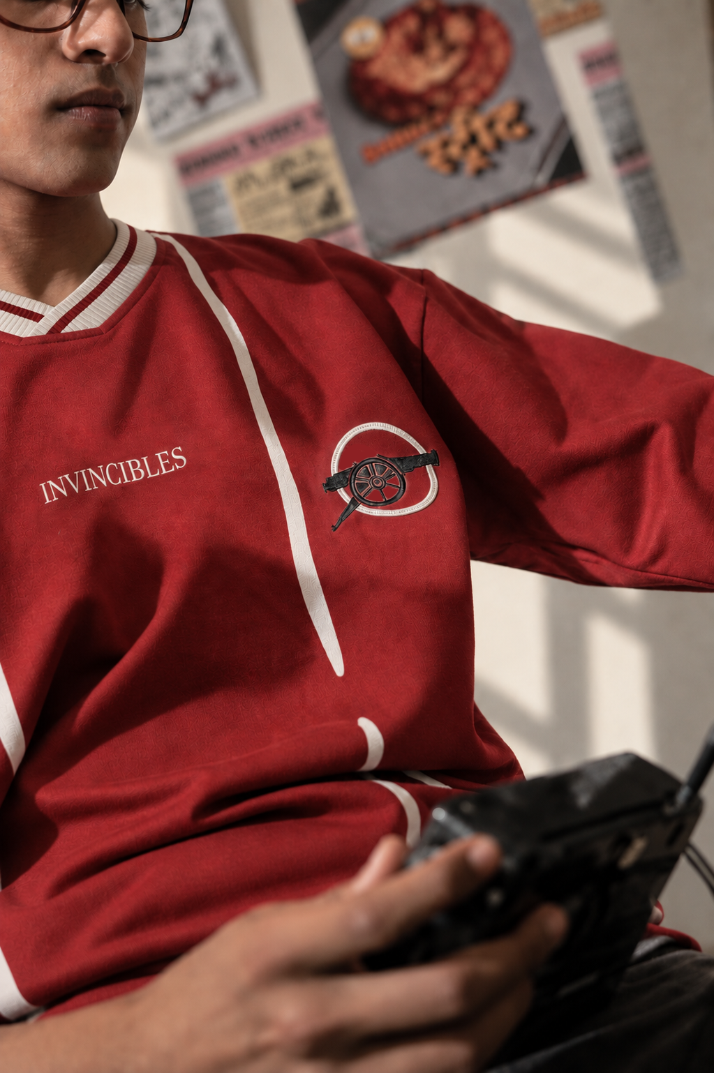 Close-up of the hand-redrawn crest on The Gunners Retro Tee