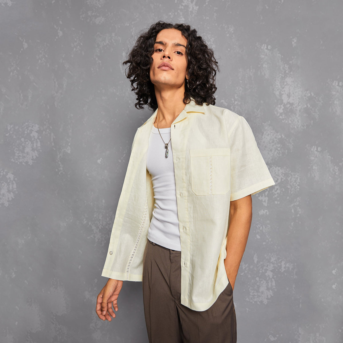 model, lookbook, linen shirt, relaxed fir, creme white, white linen shirt, laced up linen, lace detail, mens fashion, men's style inspiration, neat look, warping theories, summer essentials, people also ask