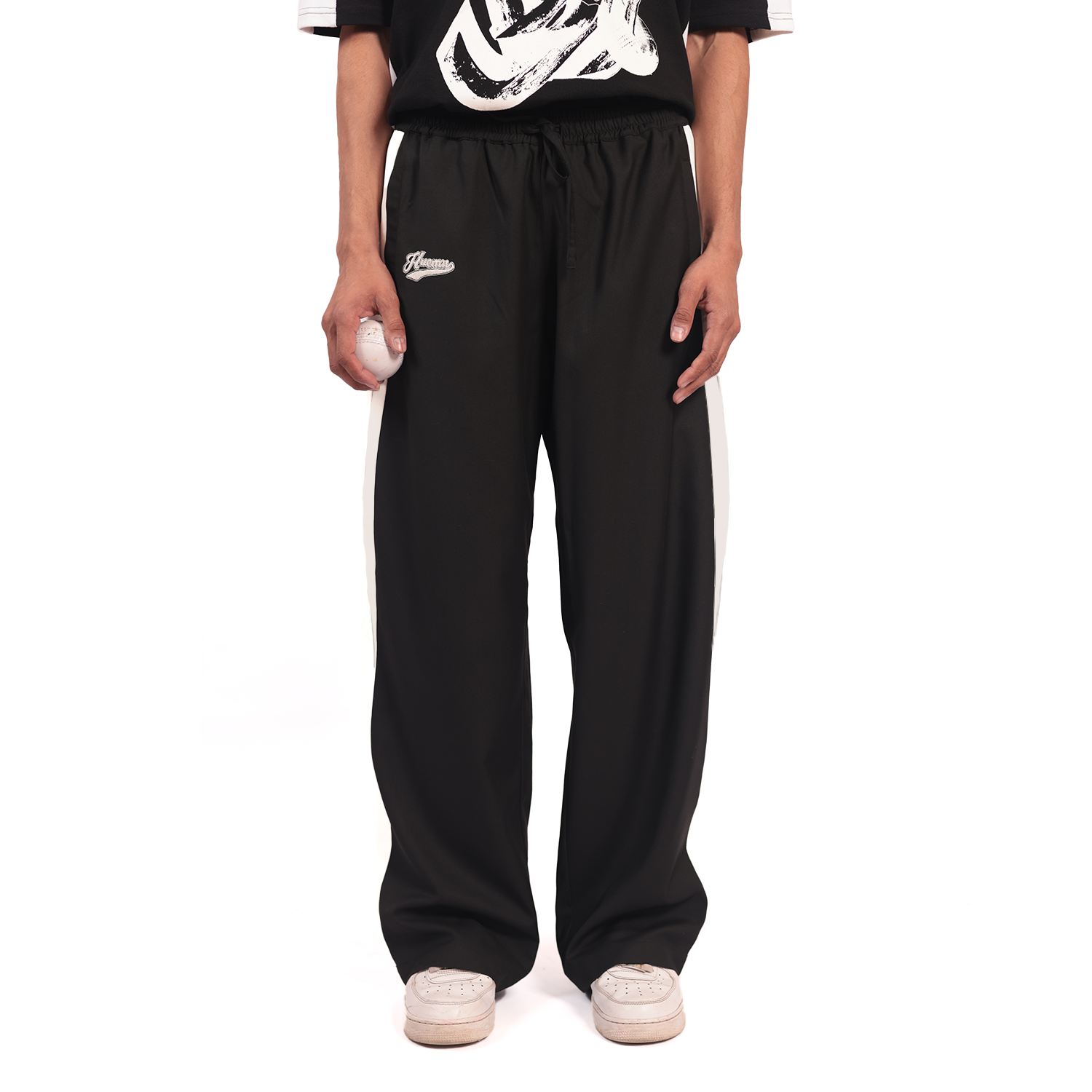 Shreyas Iyer x HUEMN embroidered trackpant with panelled detail (Black)