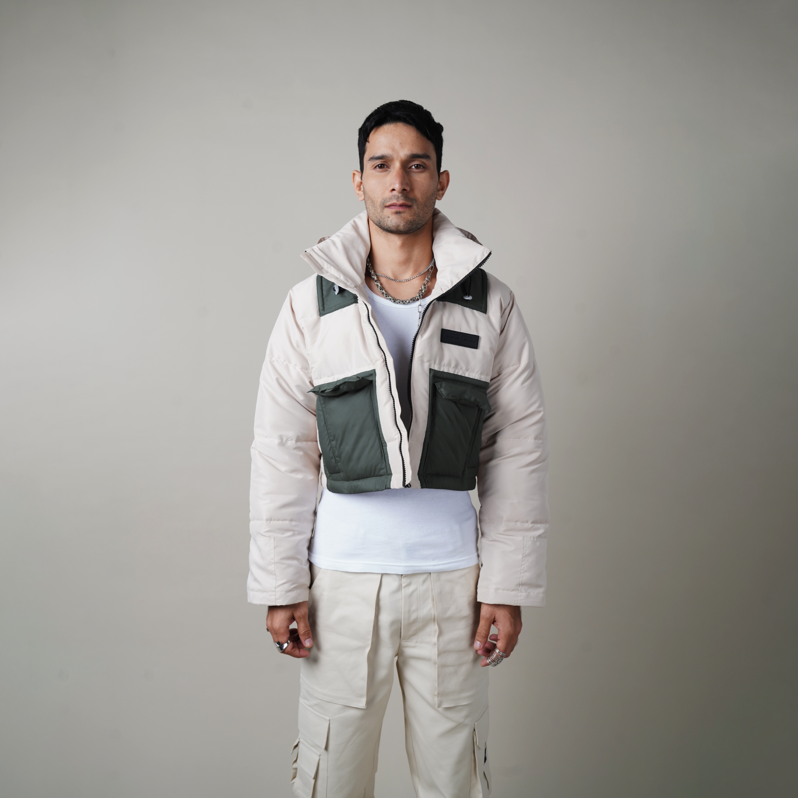 model, editoria, mensfashion, puffed, The Cropped Puffer Jacket,Polyester fabric,  two-toned, jetted pockets, pipe-in details, Welt pocket,  Warping Theories Rubber patch on the chest, high neck collar. The detachable hoodie, Unisex, Oversized Fit ,Wind Proof, Water Repellant, pufferjacket, northface puffer, puffer, puffercoat,superpuff aritzia, mens puffer, womens puffer, northface cropped puffer, womenswear, menswear, people also ask 