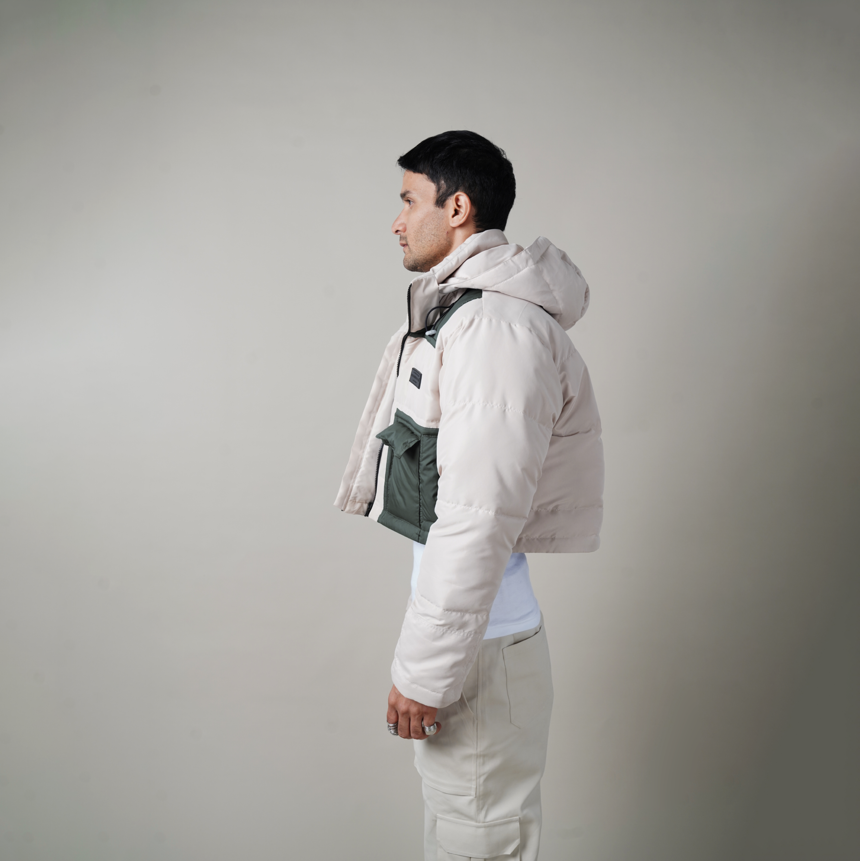 The Cropped Puffer Jacket,Polyester fabric,  two-toned, jetted pockets, pipe-in details, Welt pocket,  Warping Theories Rubber patch on the chest, high neck collar. The detachable hoodie, Unisex, Oversized Fit ,Wind Proof, Water Repellant, pufferjacket, northface puffer, puffer, puffercoat,superpuff aritzia, mens puffer, womens puffer, northface cropped puffer, womenswear, menswear, baggy fit, oversized fit, warping theories, people also ask 