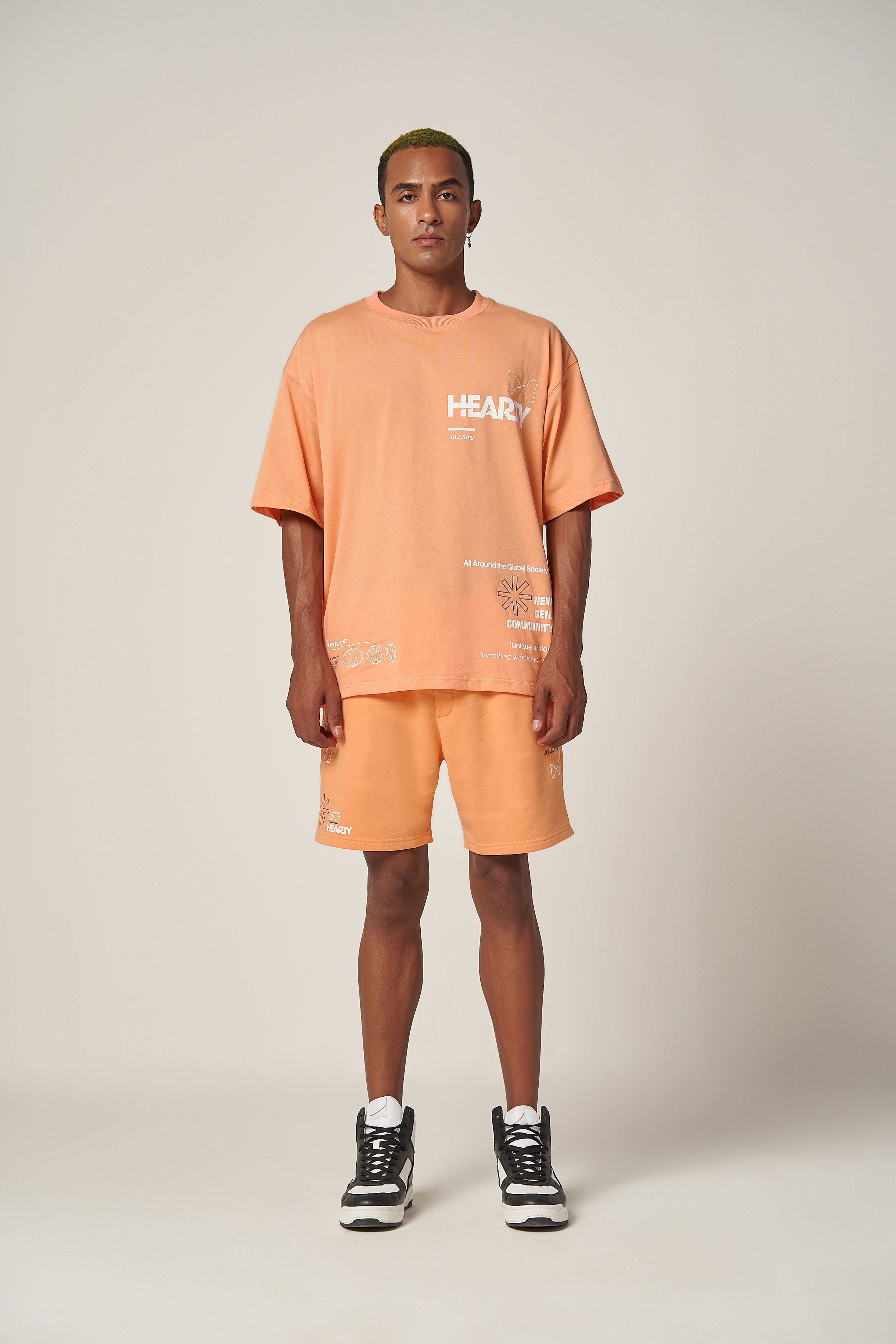 HEARTY GLOBAL COMMUNITY T-SHIRT - SOFT ORANGE (UNISEX)