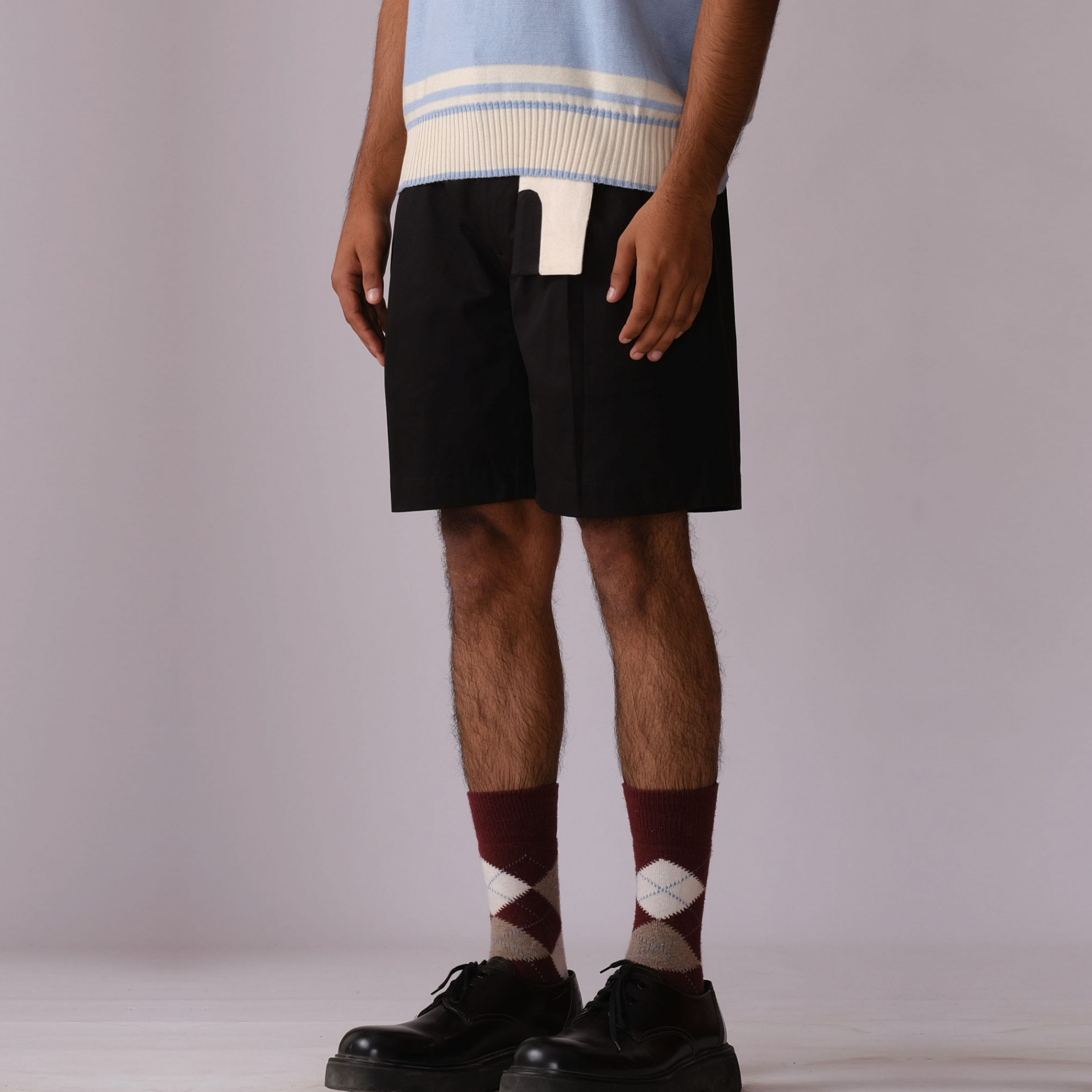 Pleated Shorts with Detachable Human Symbol