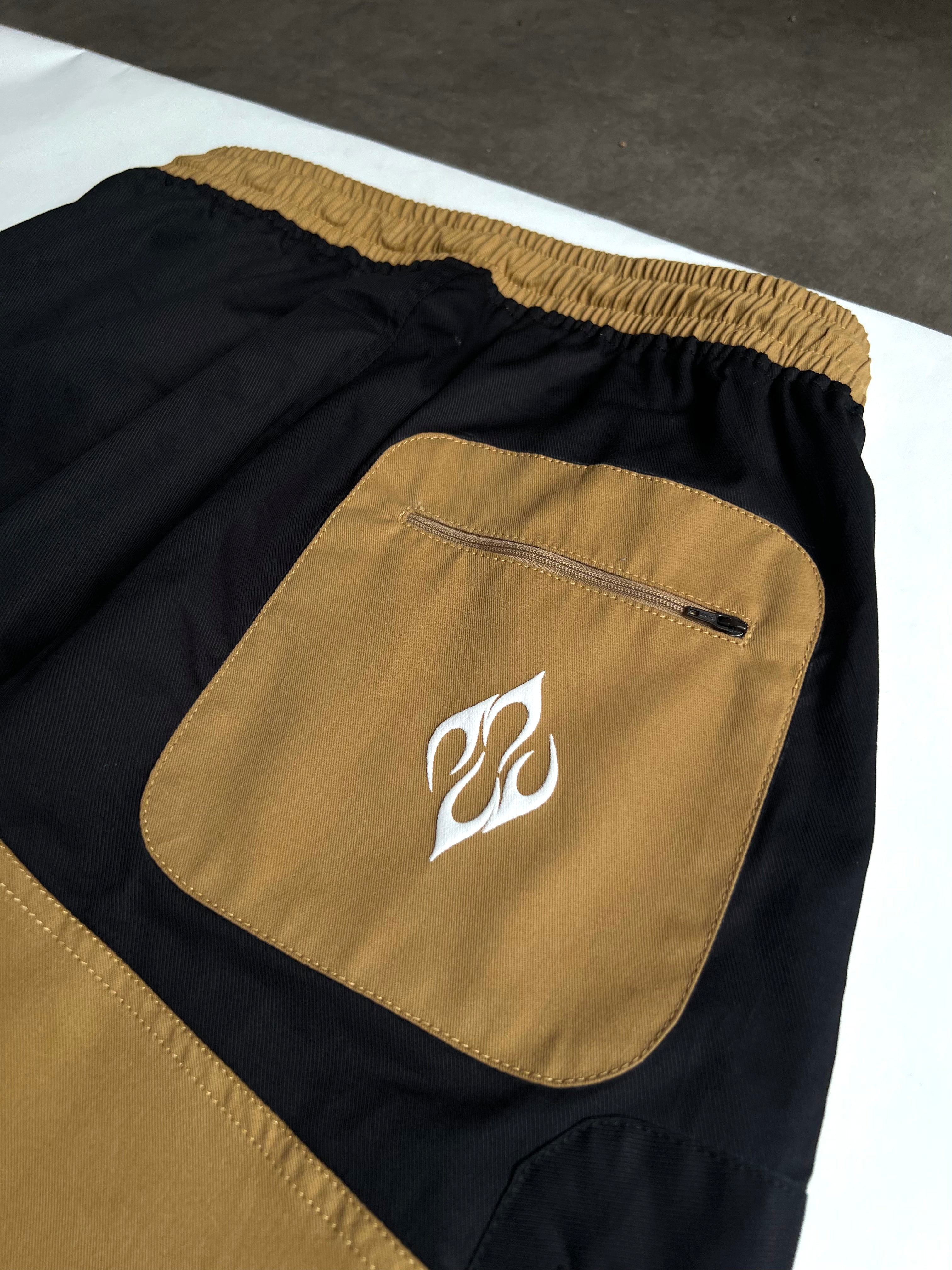 Utility panelled desert-black pant.