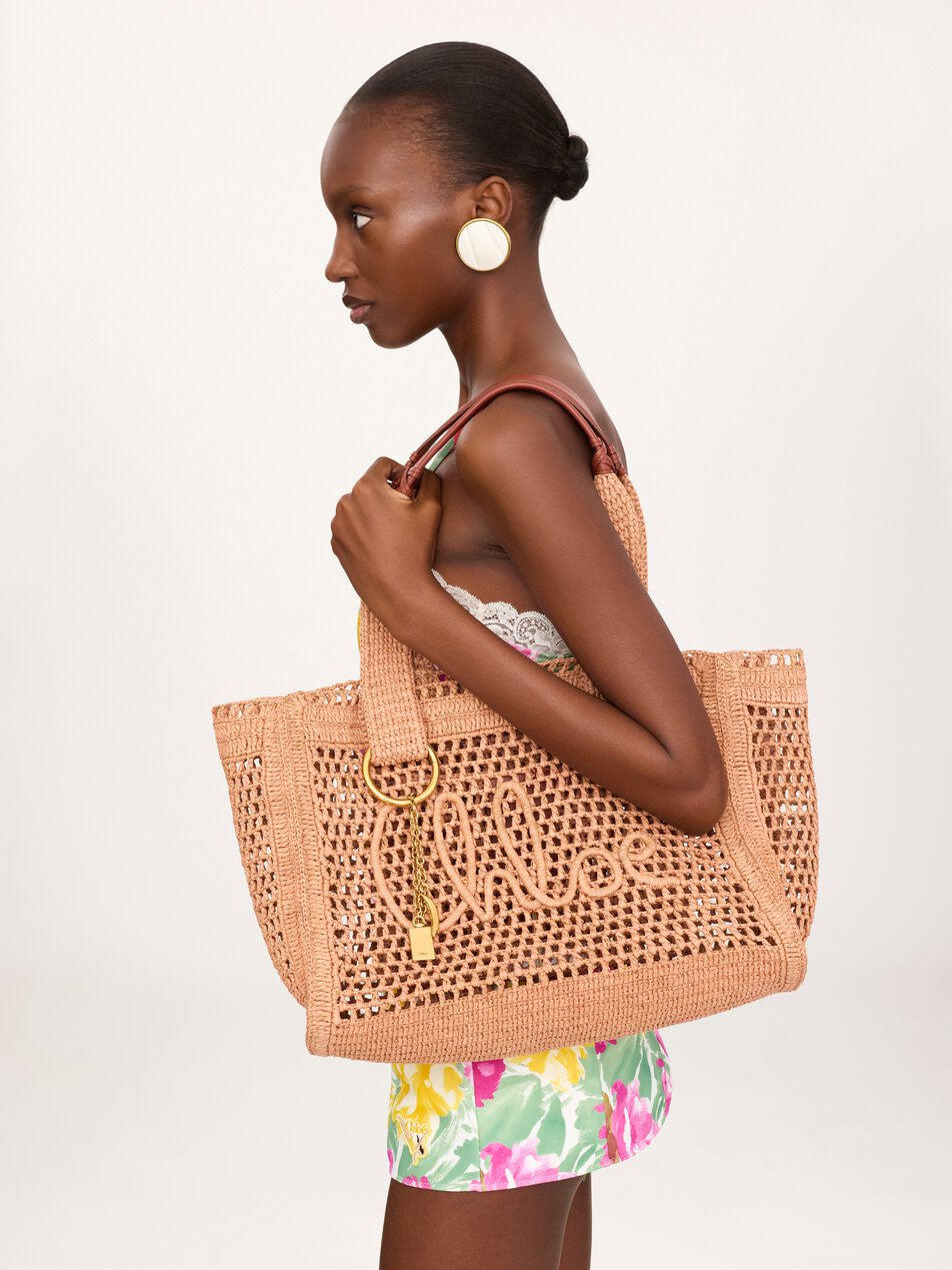 CHLOE Summer Banana east-west tote bag in raffia Summery Beige