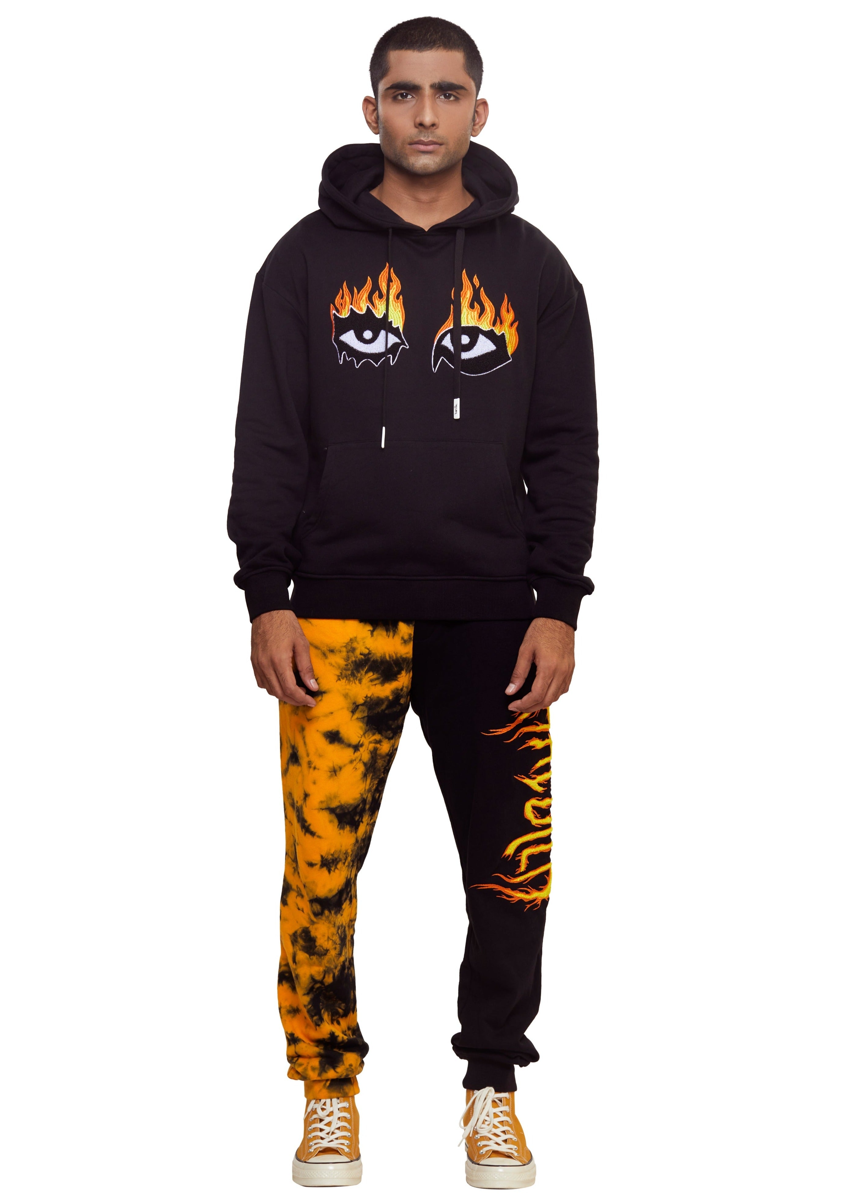 Yellow and black Tie dyed "Flames" graphic knit jogger from the brand Haculla