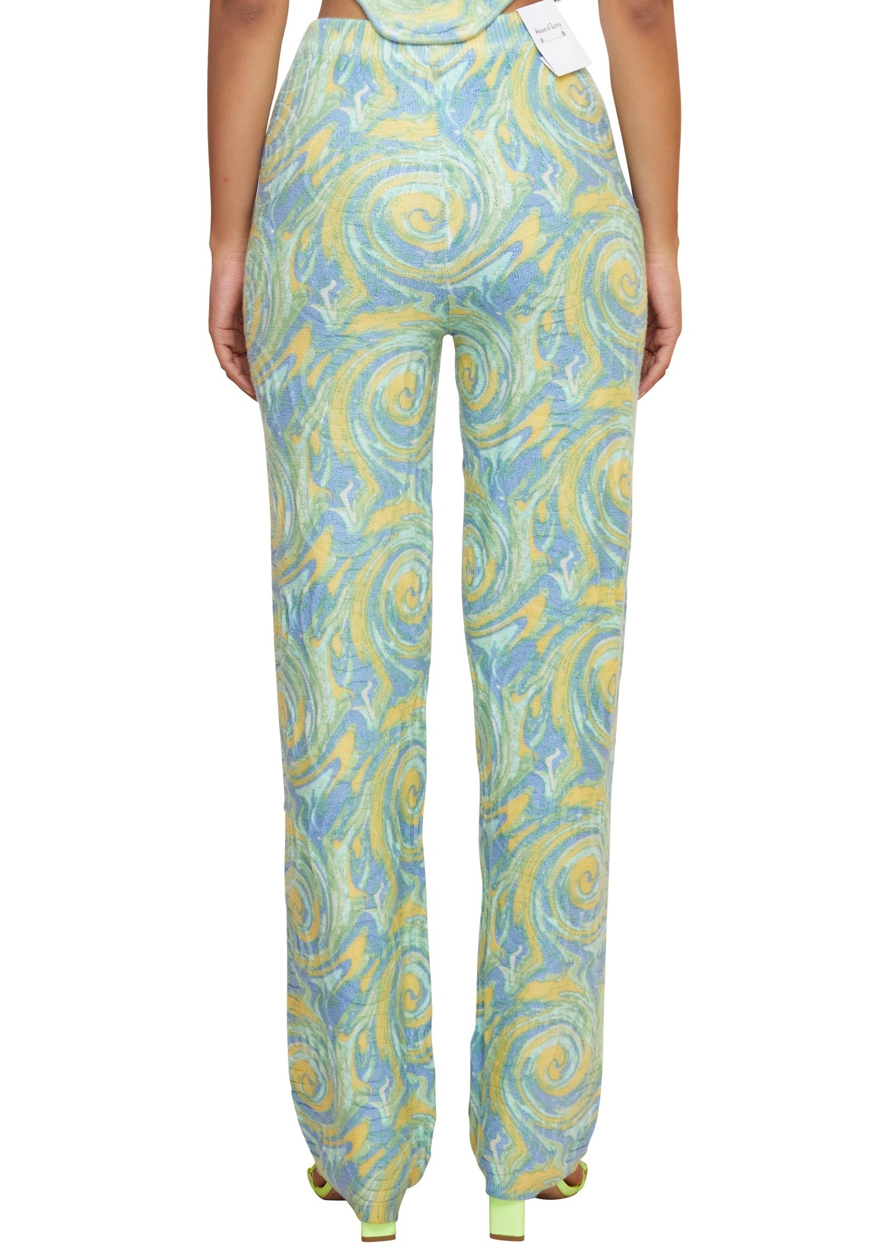 A blue and green rib kniited pants with a print inspired by a beautiful beach. Soft and stetchy from the brand House of sunny